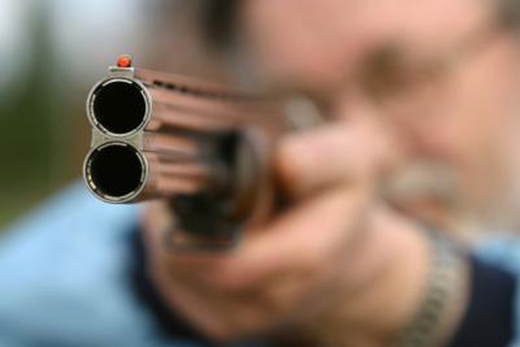 Jupiterimages/Photos.com/Getty Images There are laws regarding buying, selling and trading firearms.