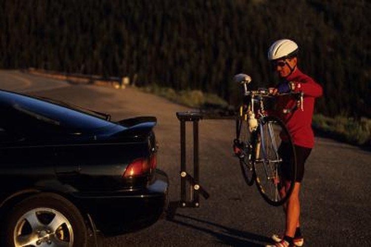 Karl Weatherly/Photodisc/Getty Images Use hitch racks on non-traditional trunk lids.