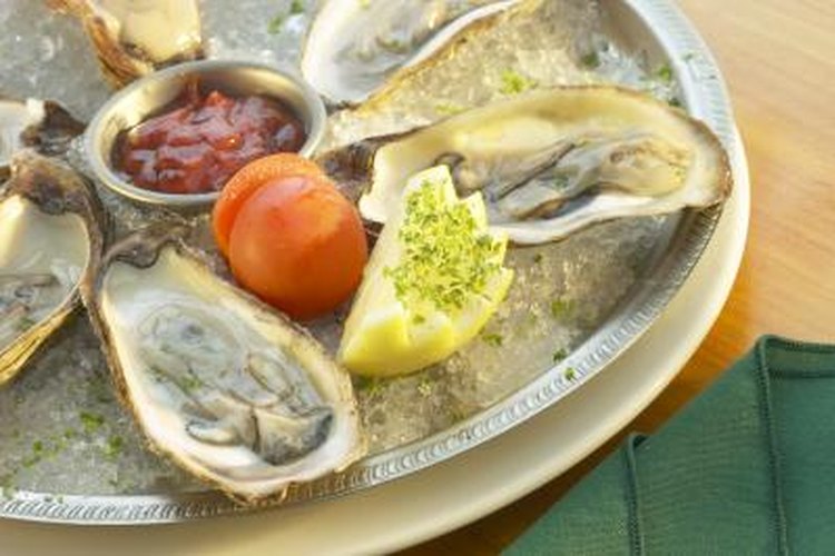 Hemera Technologies/AbleStock.com/Getty Images Catch and serve your own plate of delicious, fresh oysters.