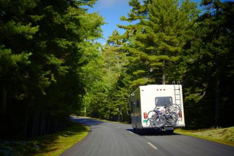 Thomas Northcut/Photodisc/Getty Images Restore a faded motorhome with a fresh layer of gelcoat paint.