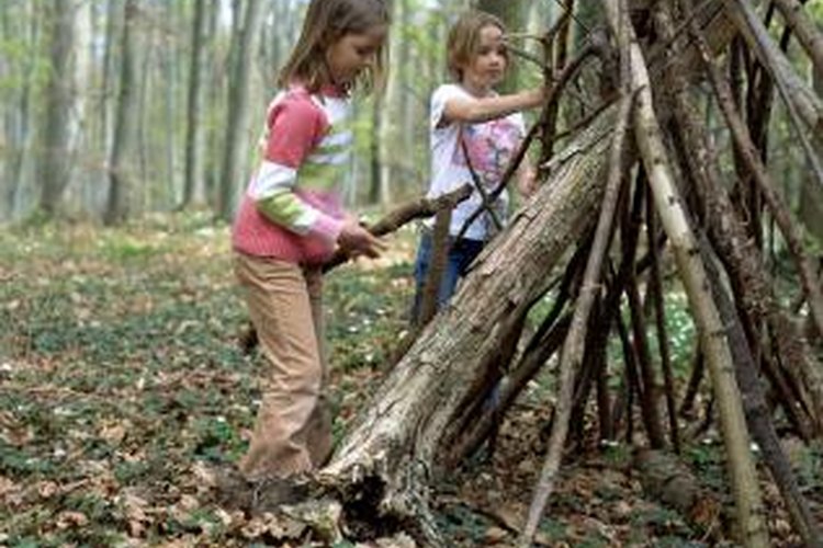 Creatas Images/Creatas/Getty Images Make a fort with dry branches and rope.