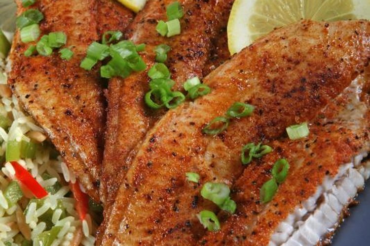 Jack Puccio/iStock/Getty Images Catfish fillets are often baked or breaded and fried.