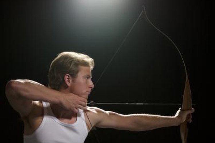 Siri Stafford/Digital Vision/Getty Images An archer is aiming a bow and arrow.