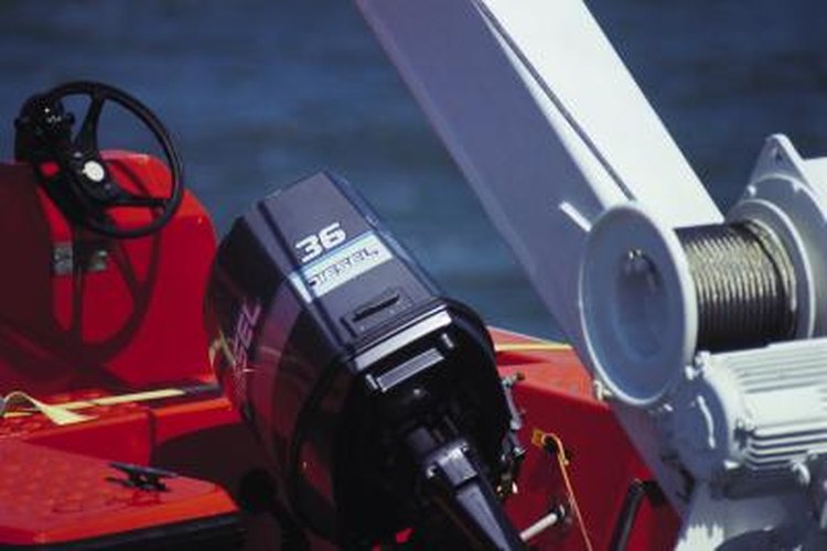 John Foxx/Stockbyte/Getty Images Construct a custom power tilt mechanism for an outboard engine.
