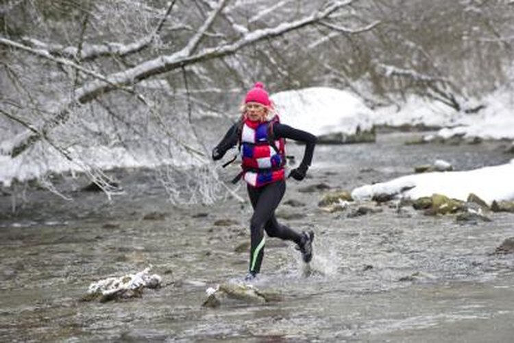 David J Spurdens/Digital Vision/Getty Images Salomon trail running shoes have a unique lacing apparatus.