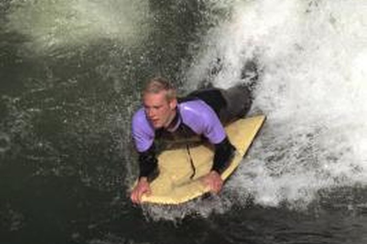 Comstock Images/Comstock/Getty Images A leash tethers you to your boogie board.
