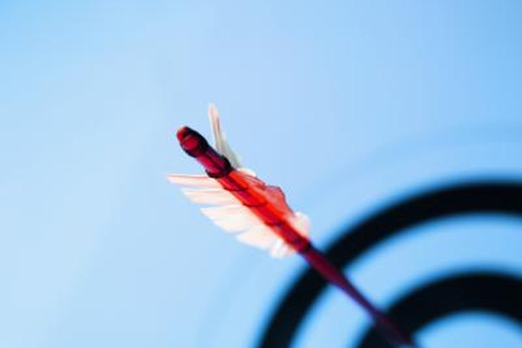 Stockbyte/Stockbyte/Getty Images Properly installing and tuning your arrow nocks helps improve your accuracy.