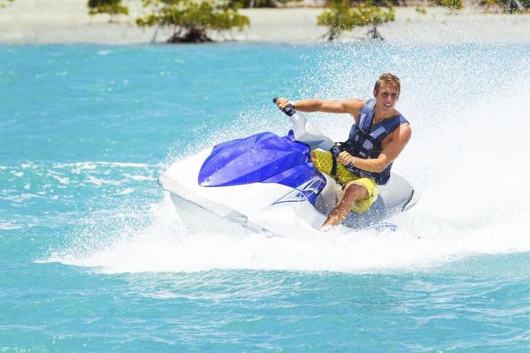 EpicStockMedia/iStock/Getty Images Man riding a Sea-Doo in tropical waters.
