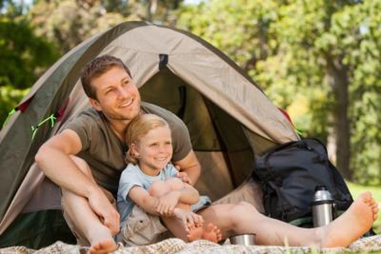 Wavebreakmedia Ltd/Wavebreak Media/Getty Images Father and son camping