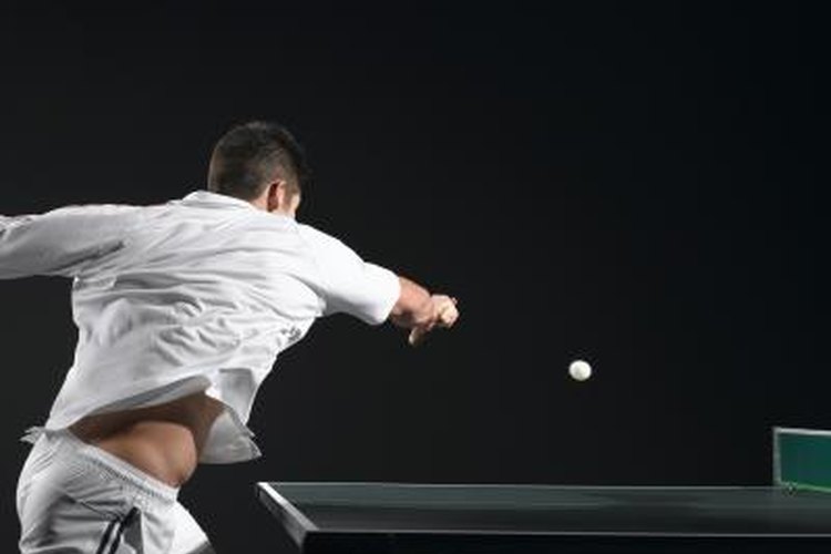 Ryan McVay/Photodisc/Getty Images One racket blade must be red and the other black or blue.