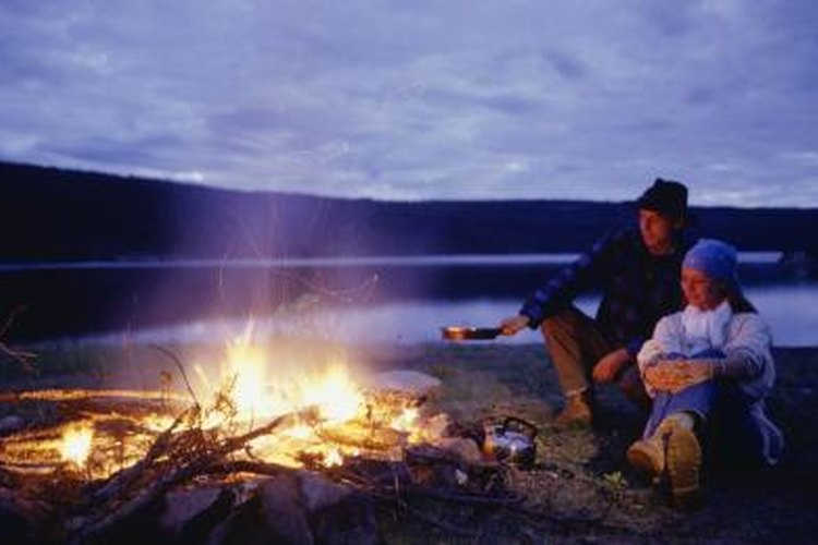 David De Lossy/Photodisc/Getty Images The campfire is a highlight of most camping trips.