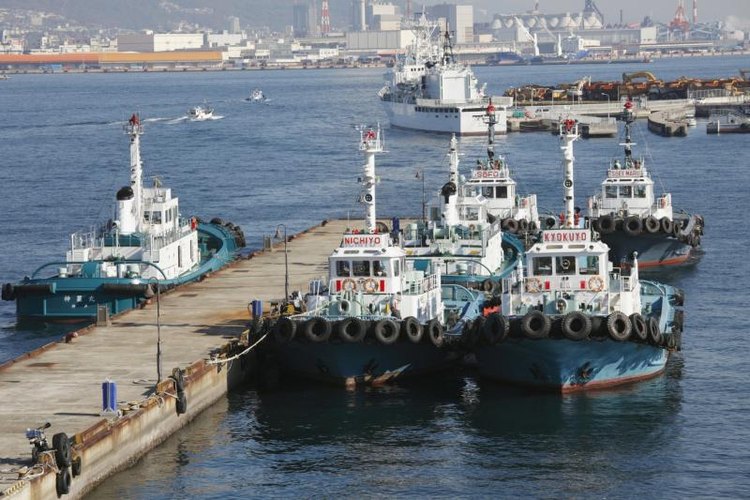 HIRO/amanaimagesRF/amana images/Getty Images Boats parking at a dock.