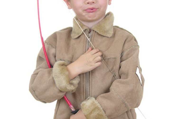 archery boy five image by Paul Moore from Fotolia.com Children can learn archery at some centers.