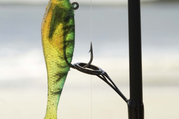 Jupiterimages/Stockbyte/Getty Images After buying a soft plastic fish, you can make your own shad by inserting a hook.