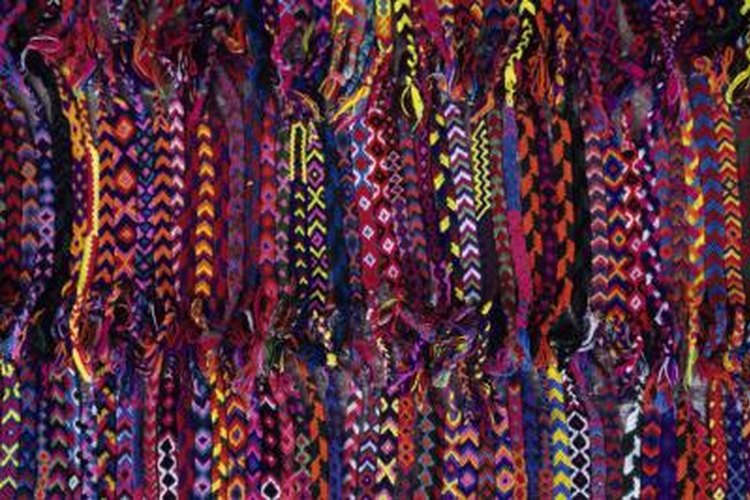 Karl Weatherly/Photodisc/Getty Images Use multiple colors of paracord to weave bright patterns.