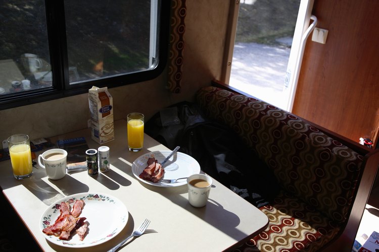 Tom Fowlks/Photodisc/Getty Images Spacious living space is an added amenity in pop-up campers.