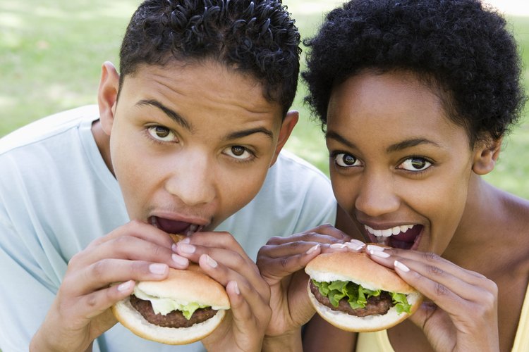 Determina la porción de carne por persona para cada sándwich.