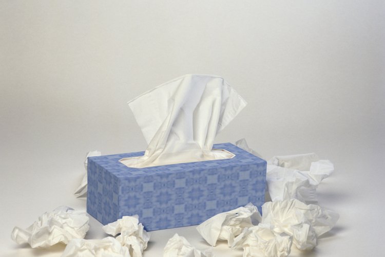 Pañuelos de papel de la congestión en la cabeza.