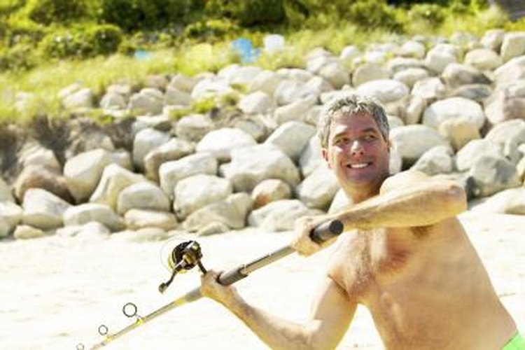 Dynamic Graphics/Dynamic Graphics Group/Getty Images Properly rig a surf rod for beach shore fishing.