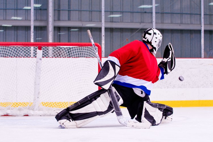 Jupiterimages/Photos.com/Getty Images Once you have your skills down, joining a hockey team is an option.