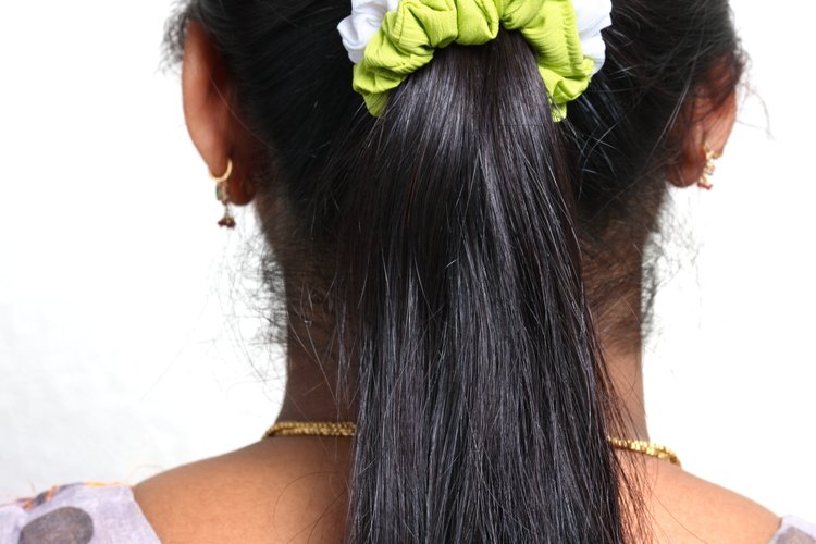 Las mujeres también sufren pérdida de cabello.