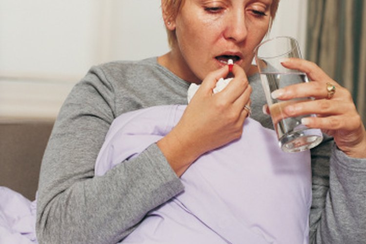 Toma las pastillas para adelgazar de vinagre de manzana con agua y parada para minimizar la irritación de la garganta.