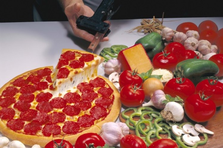 El ajo la cebolla y la salsa de tomate son desencadenantes comunes de la acidez estomacal.