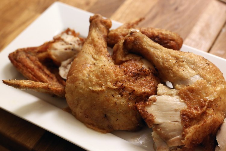 How to Deep Fry a Whole Chicken in Peanut Oil | LEAFtv