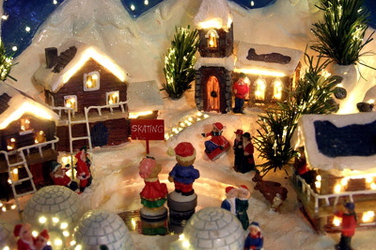 Haz tu propio pueblo navideño con colores de brillantina variados y nieve artificial.
