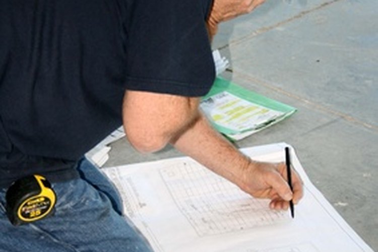 Los ingenieros arquitectos diseñan sistemas de edificios.