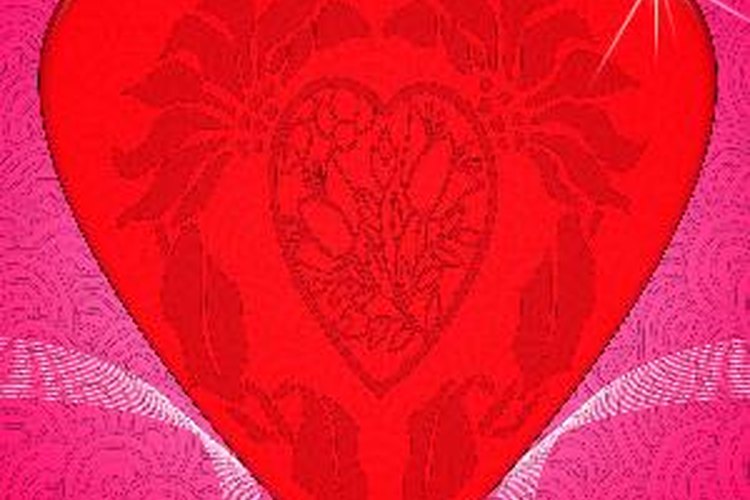 Recorta corazones rojos para los niños.