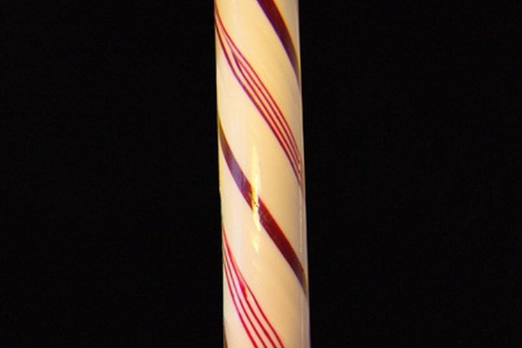 Muestra un bastón de caramelo para representar tu espíritu navideño.