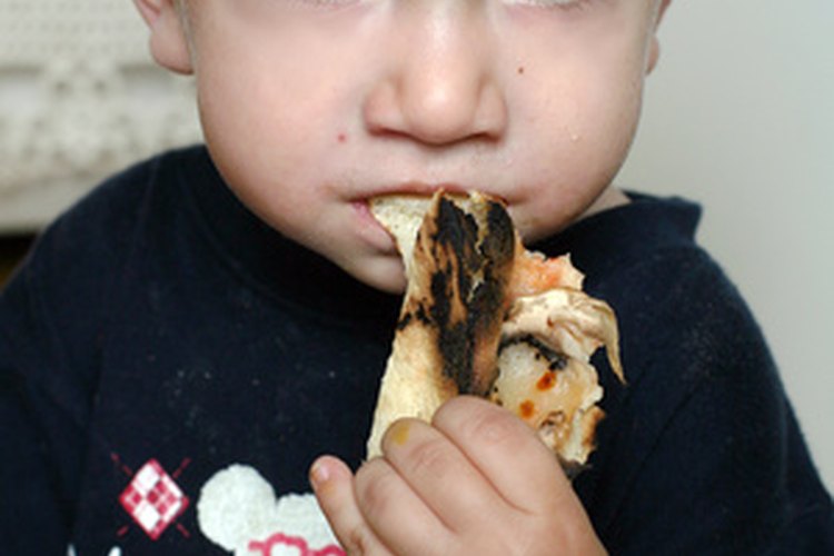 Los niños adoran la pizza casera.