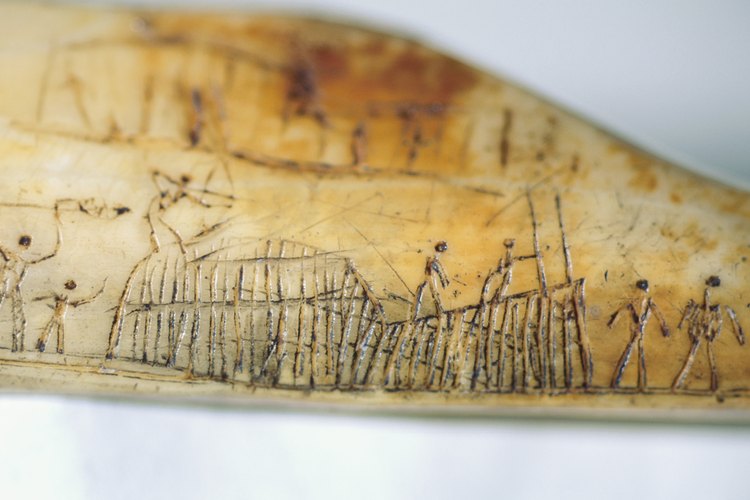 Arte aborigen que representa la construcción de refugios.