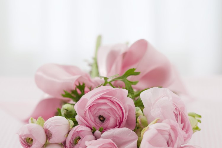Women wear flower bracelet corsages at special events.