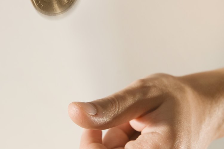 Prueba la probabilidad empírica lanzando monedas al aire.