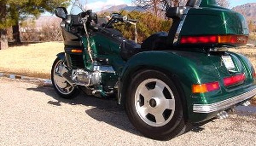 Adapt a motorcycle into a trike.