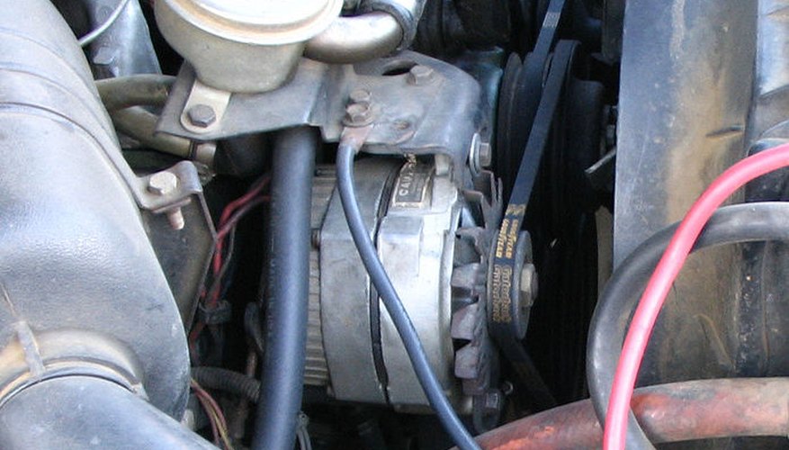 Alternator driven by a drivebelt and pulley.