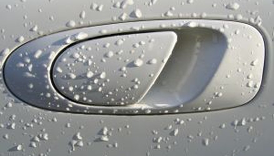 Frequent washings are just one of the many reasons a car door handle needs touch-up paint.