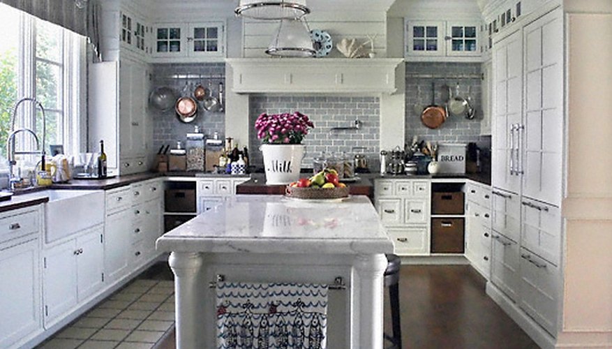 Fresh paint can open up a kitchen space.