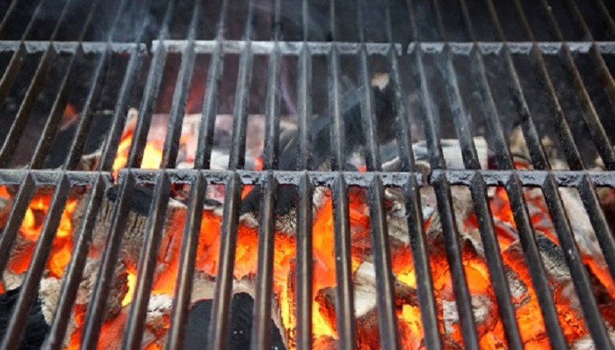 Charcoal grill construction can be simple as laying grates across breeze blocks.