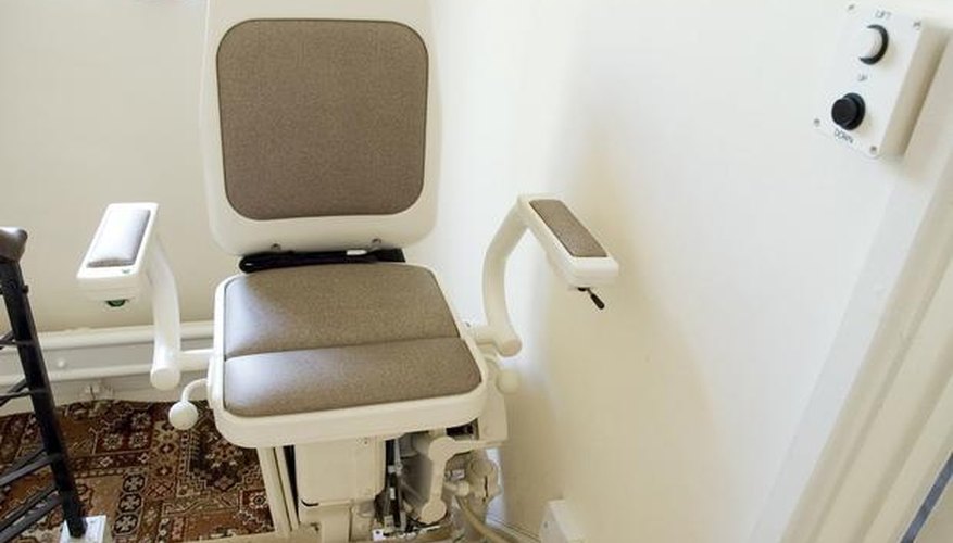 Removing the chair from a Stannah Stairlift
