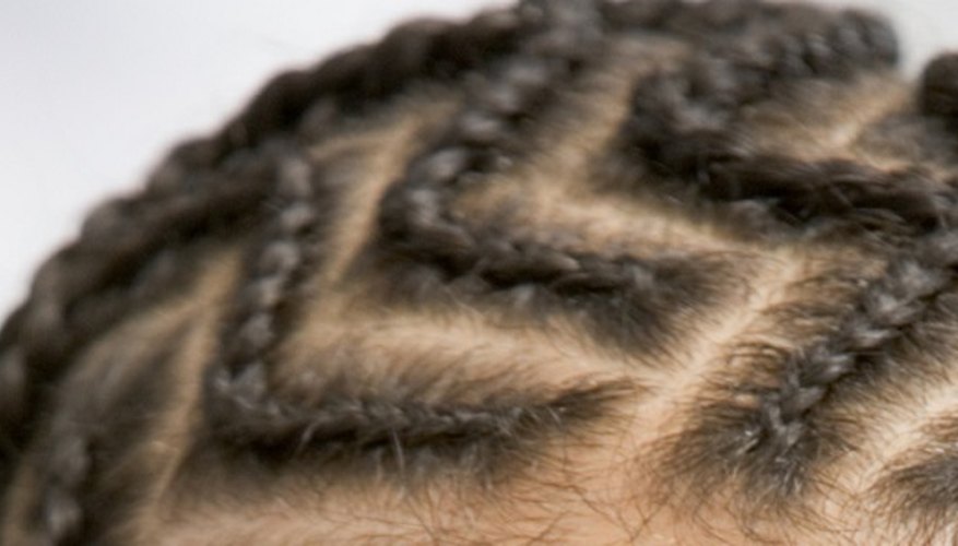 Experiment with cornrow styling to achieve unusual track patterns.