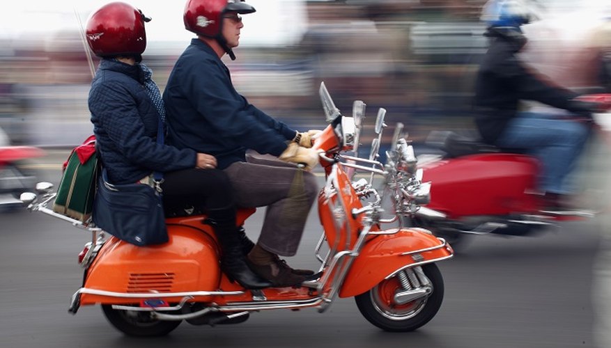 Adjust the drum brakes on your classic scooter.