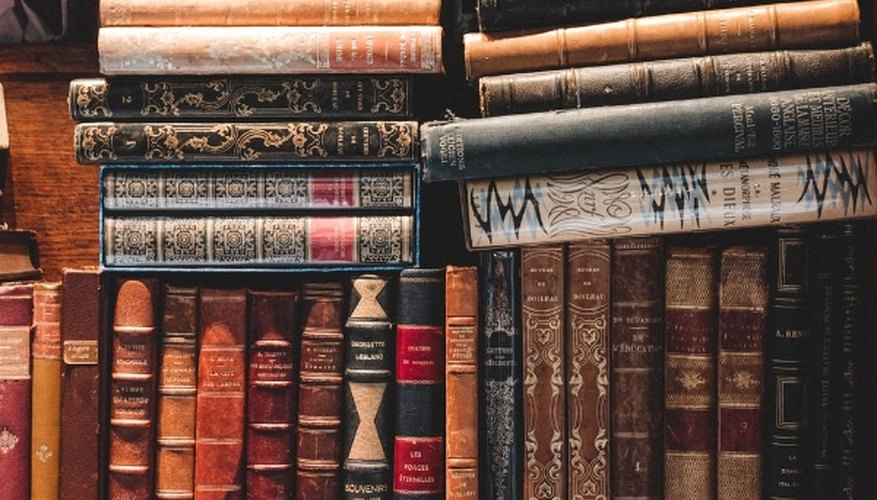 Brown and black books on shelf.jpg