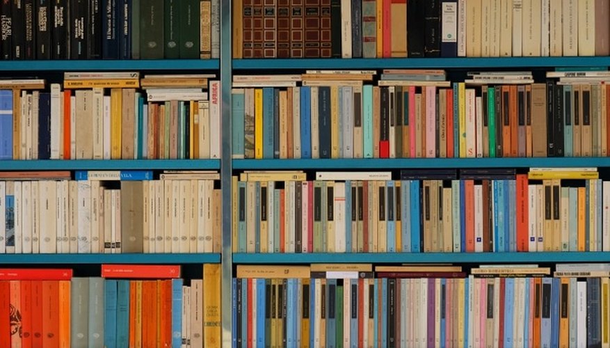 Assorted-title pile of books on shelf.jpg