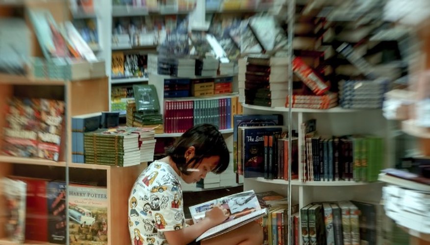 Girl writing in book store.jpg