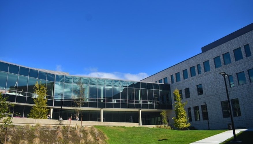 Gray concrete building under clear blue sky.jpg