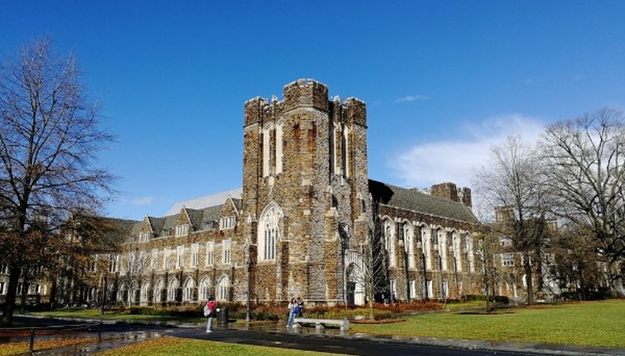 Landscape photography of a mansion under a calm blue sky.jpg