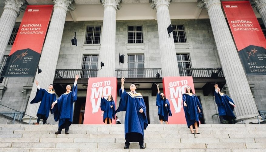 Graduates in front of building.jpg